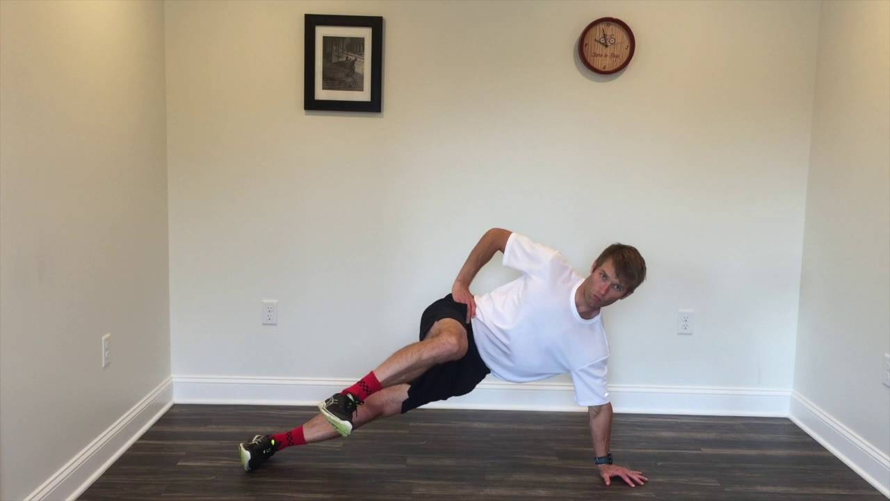 Side plank, arm extended with hip flexion & extension leg swings for