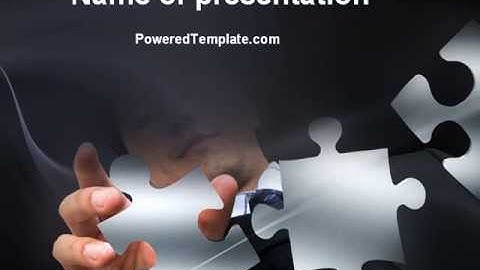 Solving Puzzle PowerPoint Template by PoweredTemplate.com