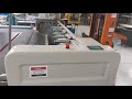 This used zund sheet feeder is for sale at the global garage