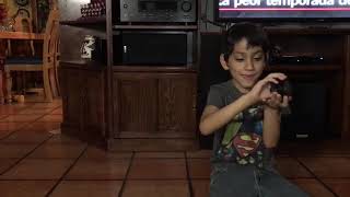 Gabriel playing with Moana the hamster