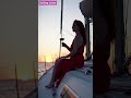 ✨ "Luxury on the Water — Red Dress, Golden Sunset, and a Glass of Bliss" #sailing #fishboat #bigboat