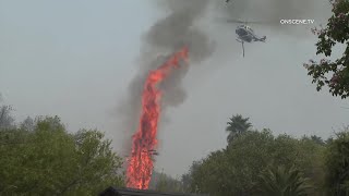 Navy Seahawk Helicopter Helps Fight Vegetation Fire in Santee