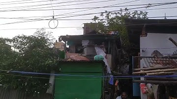 Assam University Silchar students and scholars providing drinking water to flood affected people