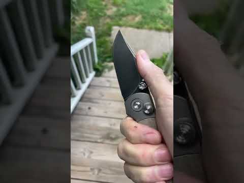 A chunky Micarta/Titanium Button Lock from TwoSun