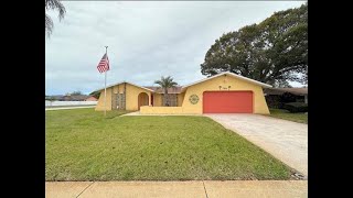 7901 WILLOW BROOK CT, HUDSON, FL 34667Corner Lot Charm  with Pool, Outdoor Oasis & Cozy Fireplace
