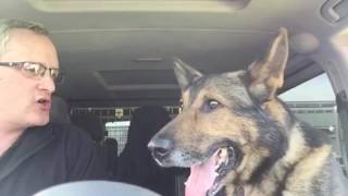 PD Finn retirement day rendition of We Are The Champions carpool doggeoke