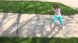 Anya playing a variation of hopscotch. screenshot 5