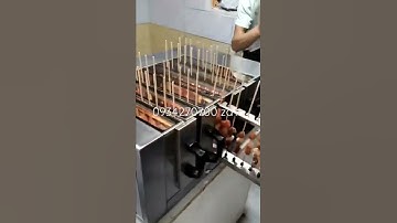 Máy nướng xiên que thịt