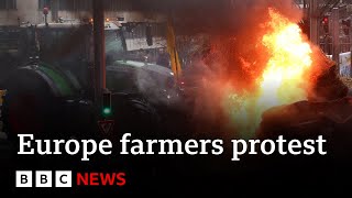 Farmers set fires in Brussels ahead of Agriculture Ministers meeting | BBC News