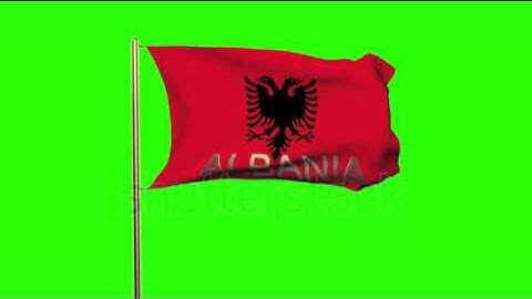 Albania flag with title waving in the wind. Looping sun rises style. Animation loop Stock video by