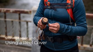 Storing tackle and using a reel cover