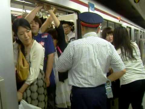 Tokyo train people sardines