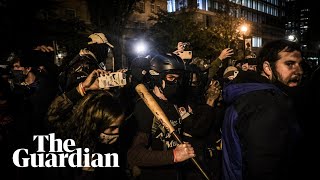 Police and protesters scuffle in Washington DC's Black Lives Matter Plaza