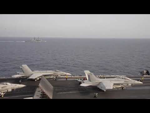 JMSDF destroyer Setogiri (DD 156) operates alongside aircraft carrier USS Dwight D. Eisenhower