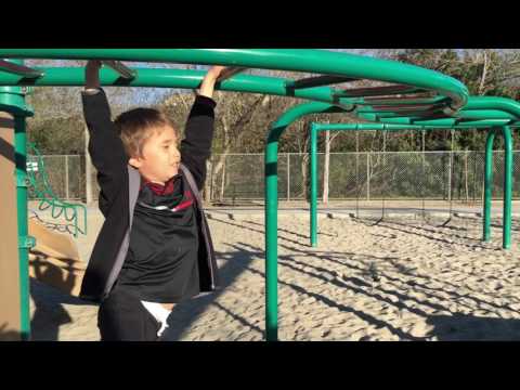Instructing Kid - How to do the monkey bars