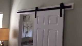 This video shows a small master bathroom remodel and includes the "barn door". It is a complete redo and is a video of the end 