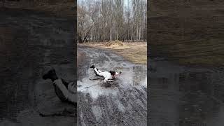 Excited Dog Unintentionally Causes Owner to Fall into the Mud