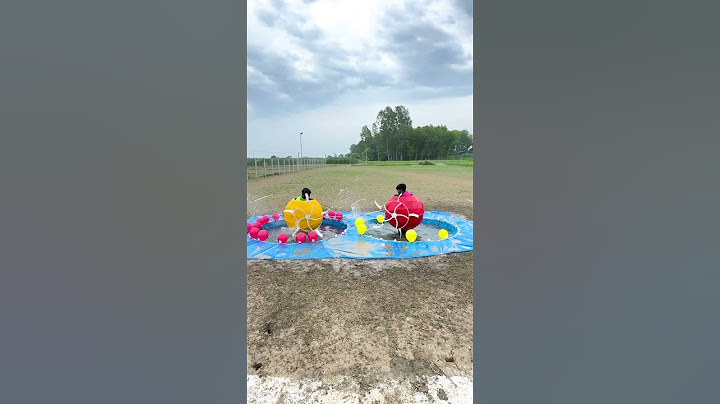 spinning splash balloon popping challenge
