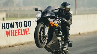 How to do a wheelie on a 1000cc Bike?