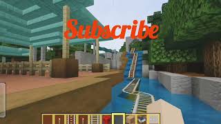“Minecraft Rail System Around River”