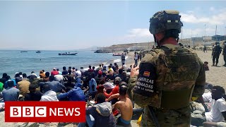 Migrants reach Spain's Ceuta enclave in record numbers – BBC News