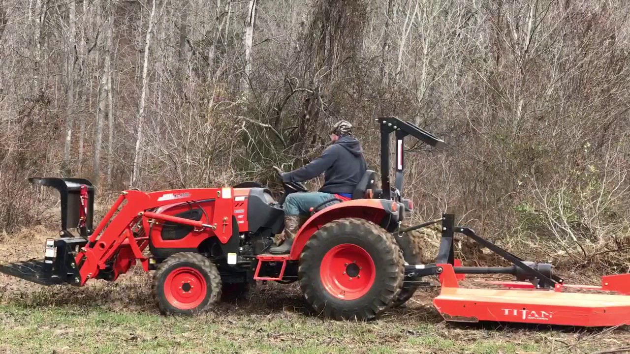 Kioti tractor with root grapple. Taking out some trees YouTube