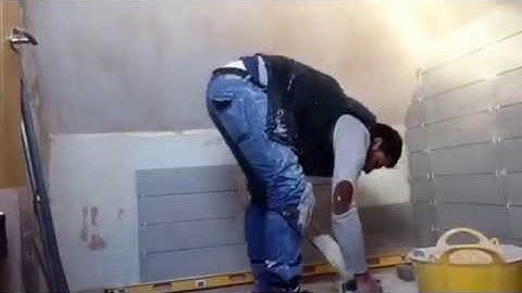 Time lapse, tiling of bathroom, mlt levelling system used.