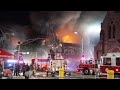 Massive fire rips through building in Paterson