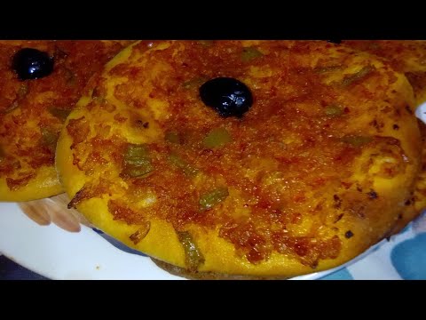فيديو: طريقة عمل البيتزا بالبصل والطماطم