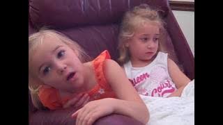 5 year old comforting her 4 year old sister who has hiccups while lovin some James Taylor