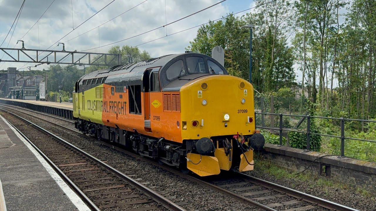 Colas 37099 and Northern 323232 pass through Runcorn on training ...