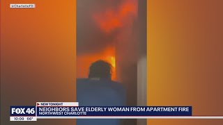 Neighbors save elderly woman from apartment fire.