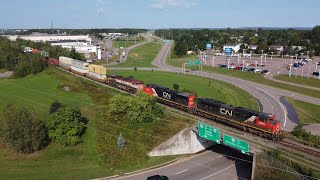 Awesome Location & 4K Aerial View! BC Rail Dash-9 Trails on a Long Stack Train CN 120 at Moncton, NB