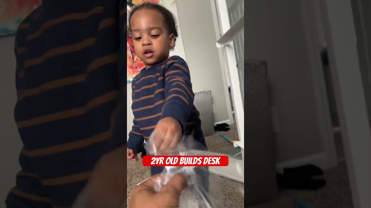 Super hero kids builds desk with Dad 