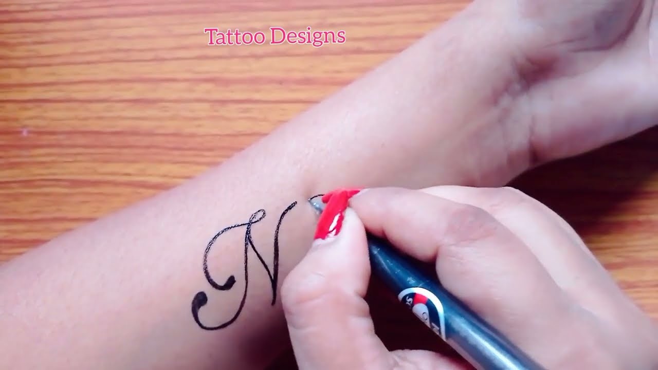 Letter N tattoo | N letter tattoo with anchor | anchor tattoo ideas with n  letter | anchor tattoo - YouTube