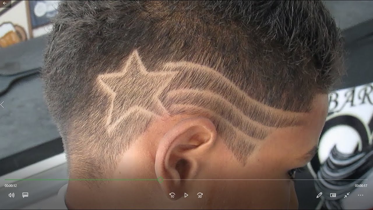 corte de cabelo masculino com desenho de estrela