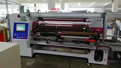 Two shafts auto rewinder with load/unload device