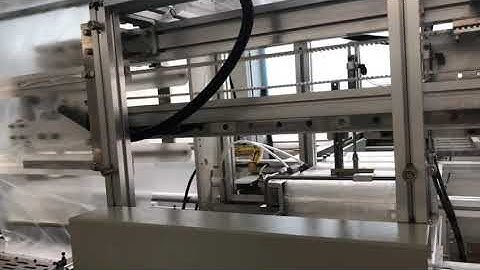 Plastic lids packing machine
