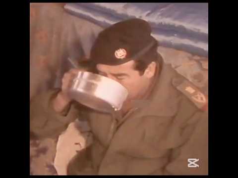 صدام حسين يأكل من خبر الراعي شاهد التواضع