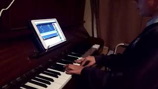 Boy teaching himself piano using a tab app. screenshot 5