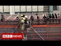 Fire at World Trade Centre in Hong Kong leaves more than 100 trapped on roof - BBC News