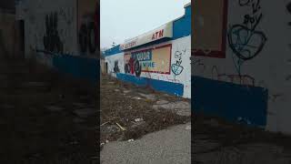 lottery and liqour abandoned business in Flint Mi