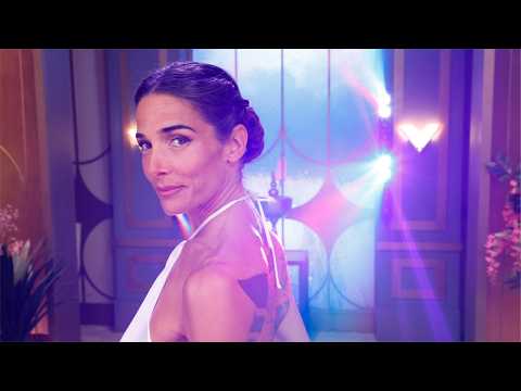 Totally Divine: Juana wore a white pants and top set by Evangelina Bomparola