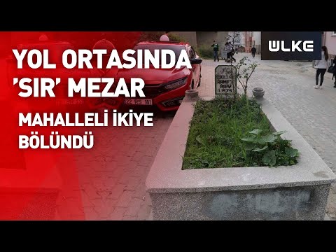 Yol ortasında 'sır mezar' mahalleliyi ikiye böldü