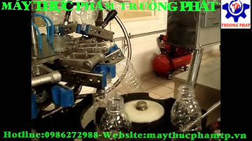 [truongphatgroup.vn]DÂY CHUYỀN ĐÓNG CHAI 12 ĐẦU CHIẾT