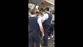 Mangu Kaha gang member being escorted by prison wardens