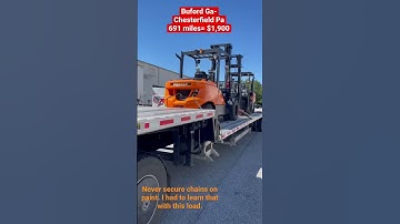 Big forklifts on step deck