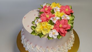 Идея украшения торта фантазийными цветами и яблоневым цветом