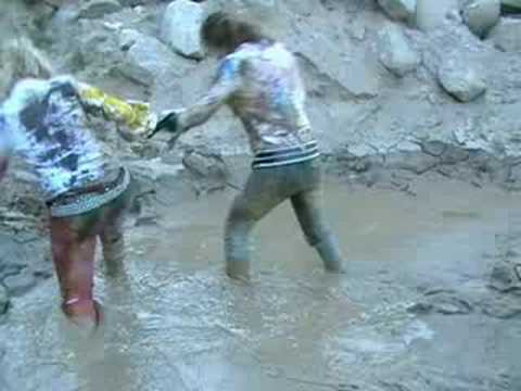 MessyModel: Laura and Kitto in paint and wet mud