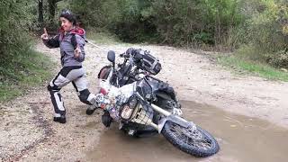 Damsel in distress lifting bike with a winch